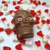 Chocolate skull with red eyes