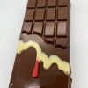 Milk chocolate bar with white chocolate and pink choclate drip