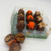 9 mini chocolate eggs with flavours of orange, hazelnut and biscoff