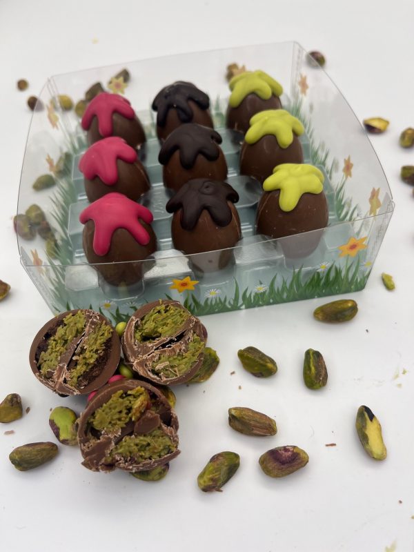 9 chocolate eggs, with raspberry pistachio, pistachio & knafeh, pistachio and brownie