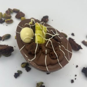 pistachio and brownie stuffed easter egg half