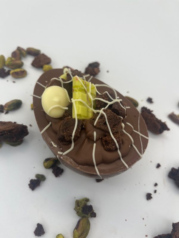 pistachio and brownie stuffed easter egg half