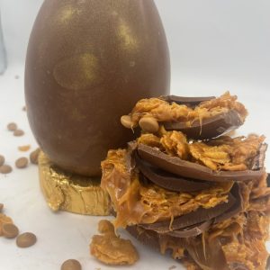 golden shimmer chocolate egg with caramel and cornflake filling easter egg